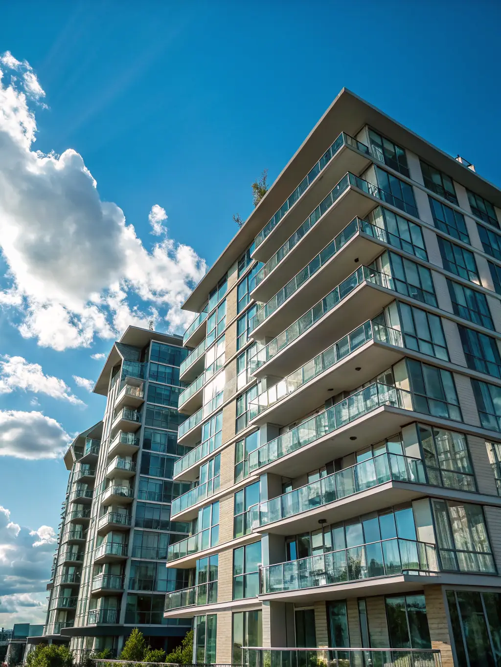 A photograph of a modern apartment building in Nairobi, Kenya, showcasing the exterior architecture and surrounding landscape, emphasizing the urban living experience.